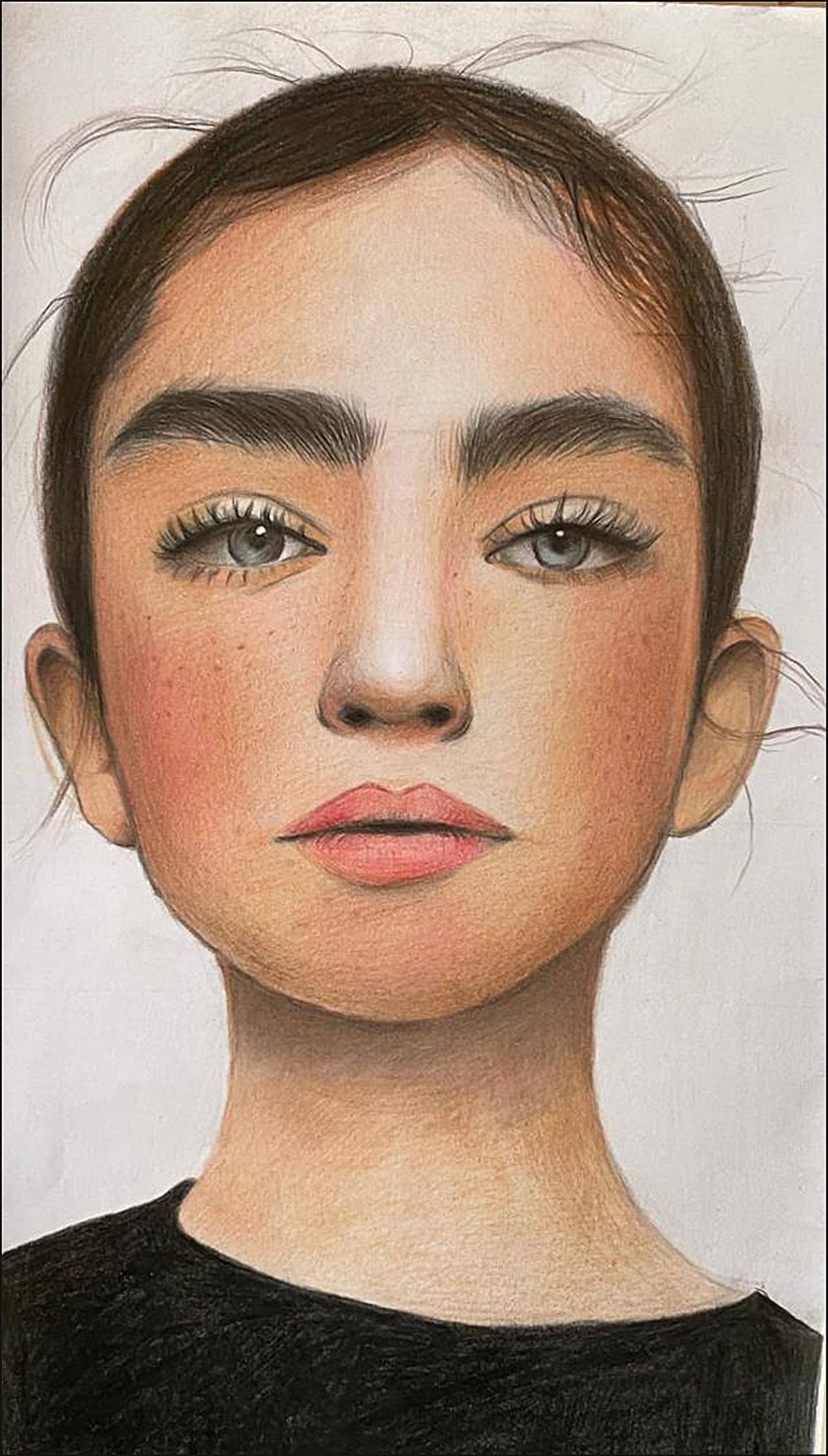 Realistic coloured pencil portrait of a young woman with dark eyebrows and hair pulled back.